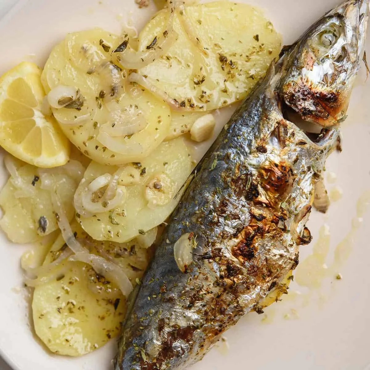 Baked Mackerel With Potatoes And Onions