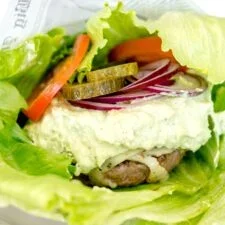 Chuck steak burgers with avocado dressing