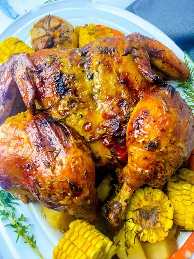 Pollo asado con ajo y hierbas
