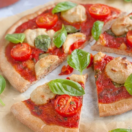 Receta de pizza vegana de espelta con cobertura Margarita