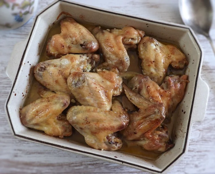 Ali di pollo al forno con olio d’oliva e limone