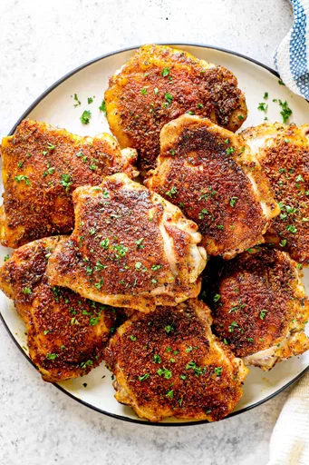 Muslos de pollo con hueso y piel