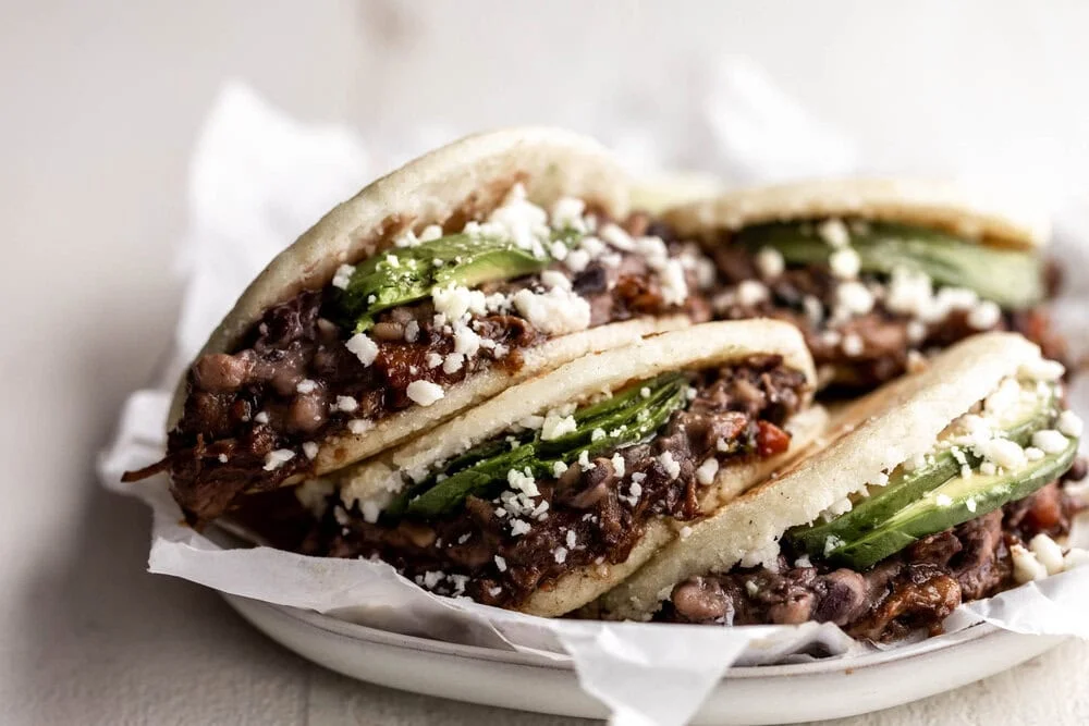 Braised Oxtail Arepas with Avocado & Black Beans