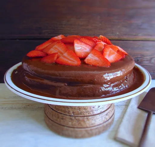 Coffee cake with chocolate mousse and strawberries