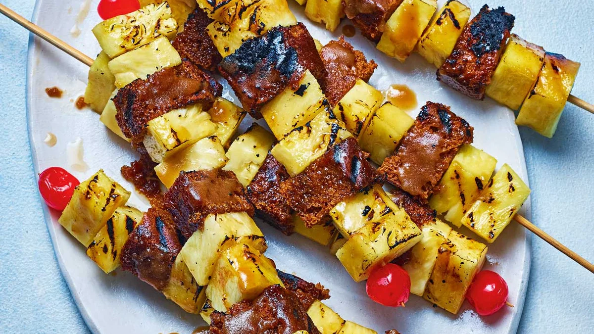 Rum-glazed pineapple and ginger cake skewers