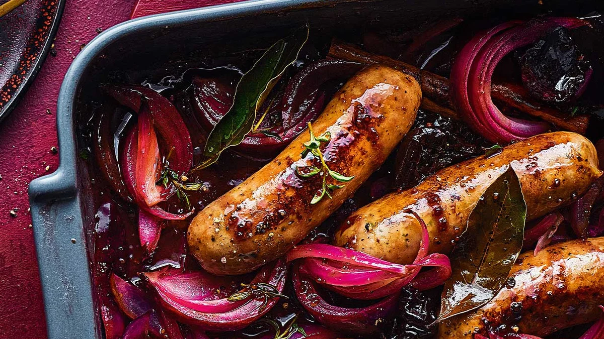 Sausage, cinnamon and prune traybake