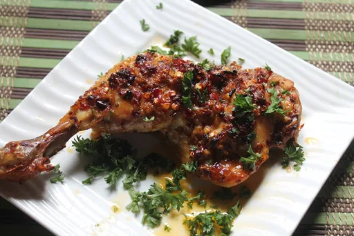 Receta de pollo al horno con ajo y hierbas