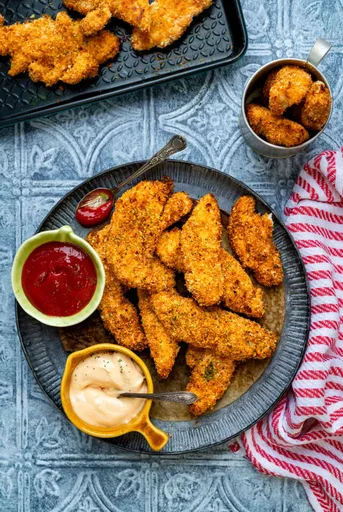 Tiras de pollo empanadas