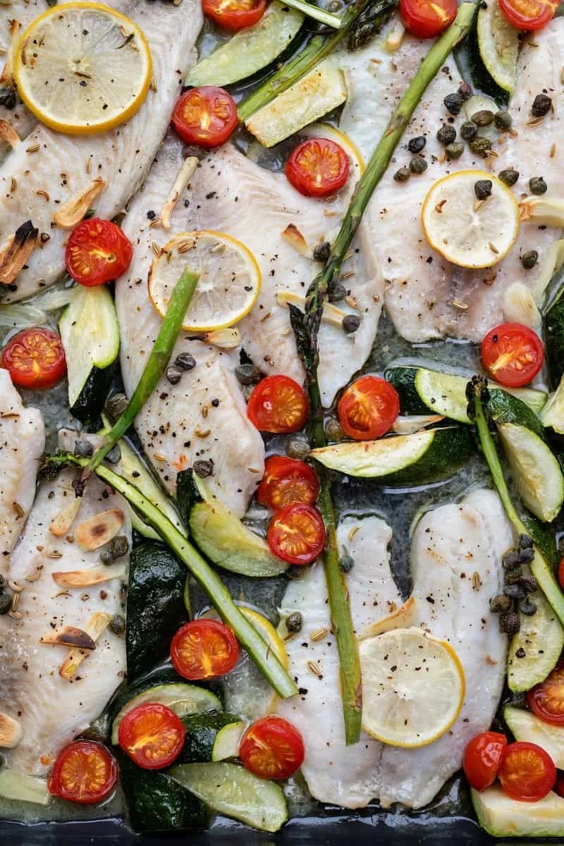 Oven-baked tilapia with zucchini and asparagus