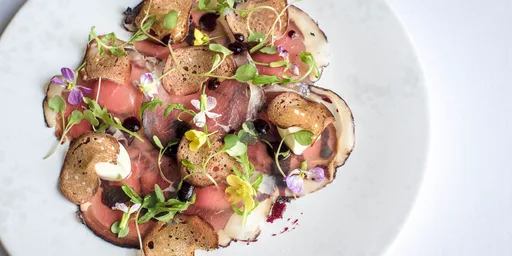 Bresaola of silverside with blackcurrants, ricotta and rocket