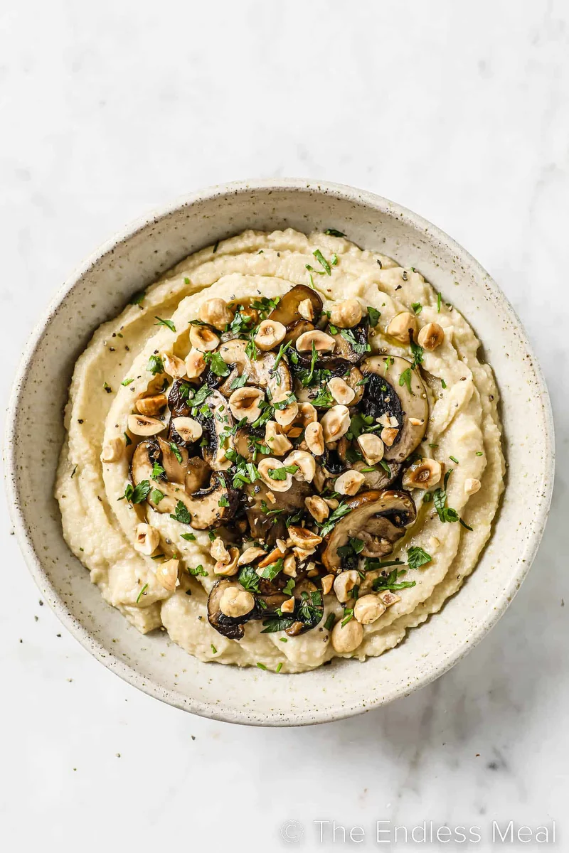 Cauliflower Polenta with Mushrooms and Hazelnuts