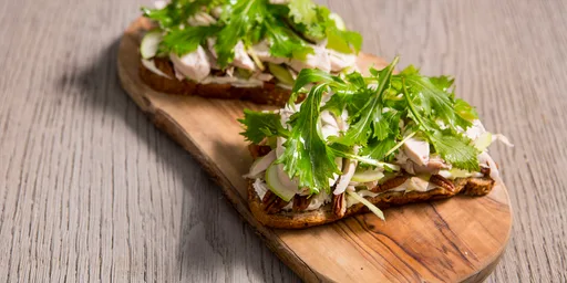 Leftover turkey sandwich with cream cheese and mizuna
