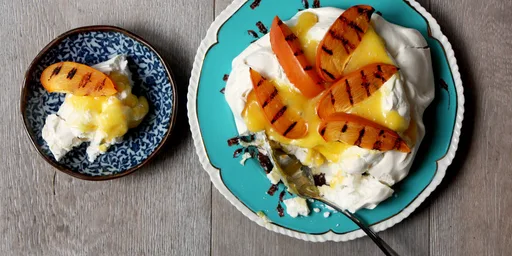 Meringue with yuzu curd and griddled persimmon