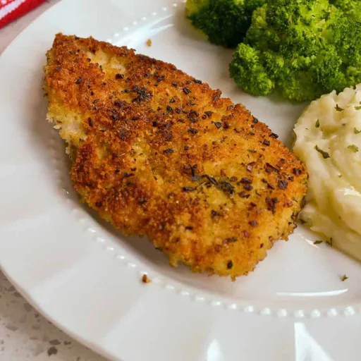 Pollo con costra de parmesano