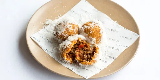 Venison bolognese fritters with Parmesan
