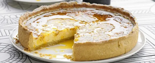 Pine nut and ricotta tart with spiced syrup