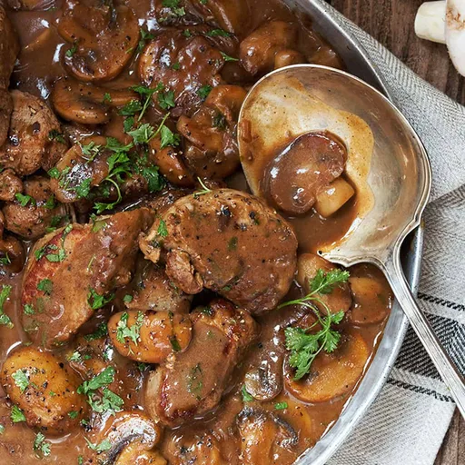 Cerdo al Marsala con setas