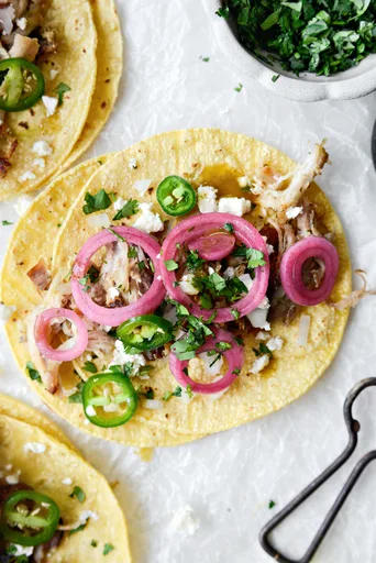 Tacos de carnitas de cerdo