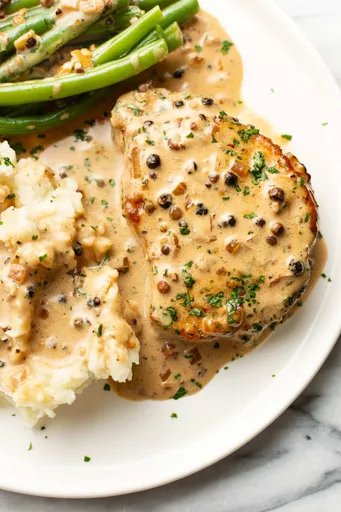 Chuletas de Cerdo con Salsa de Pimienta
