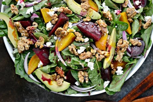 Roasted Beet Salad with Avocado, Goat Cheese and Candied Walnuts with Honey Dijon Vinaigrette