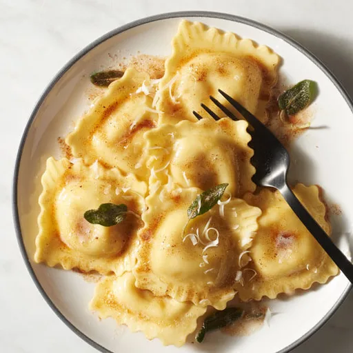 Raviolis con mantequilla tostada