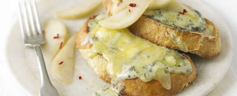 Stilton on toast with pickled pears