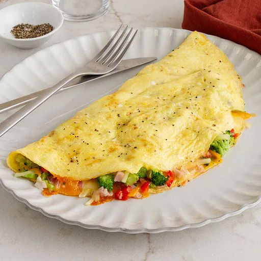 Tortilla de verduras, jamón y queso