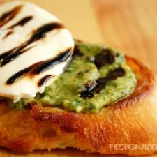 Pesto Bruschetta with Fresh Mozzarella & Balsamic Syrup