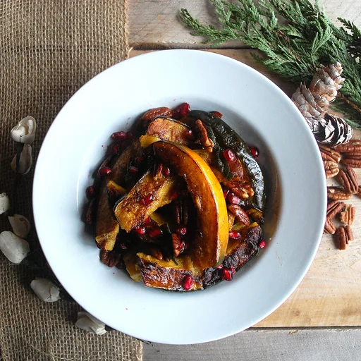 Roasted Acorn Squash with Brown Buttered Pecans and Pomegranate Seeds