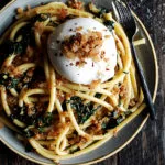 Pasta bucatini con burrata y pan rallado frito