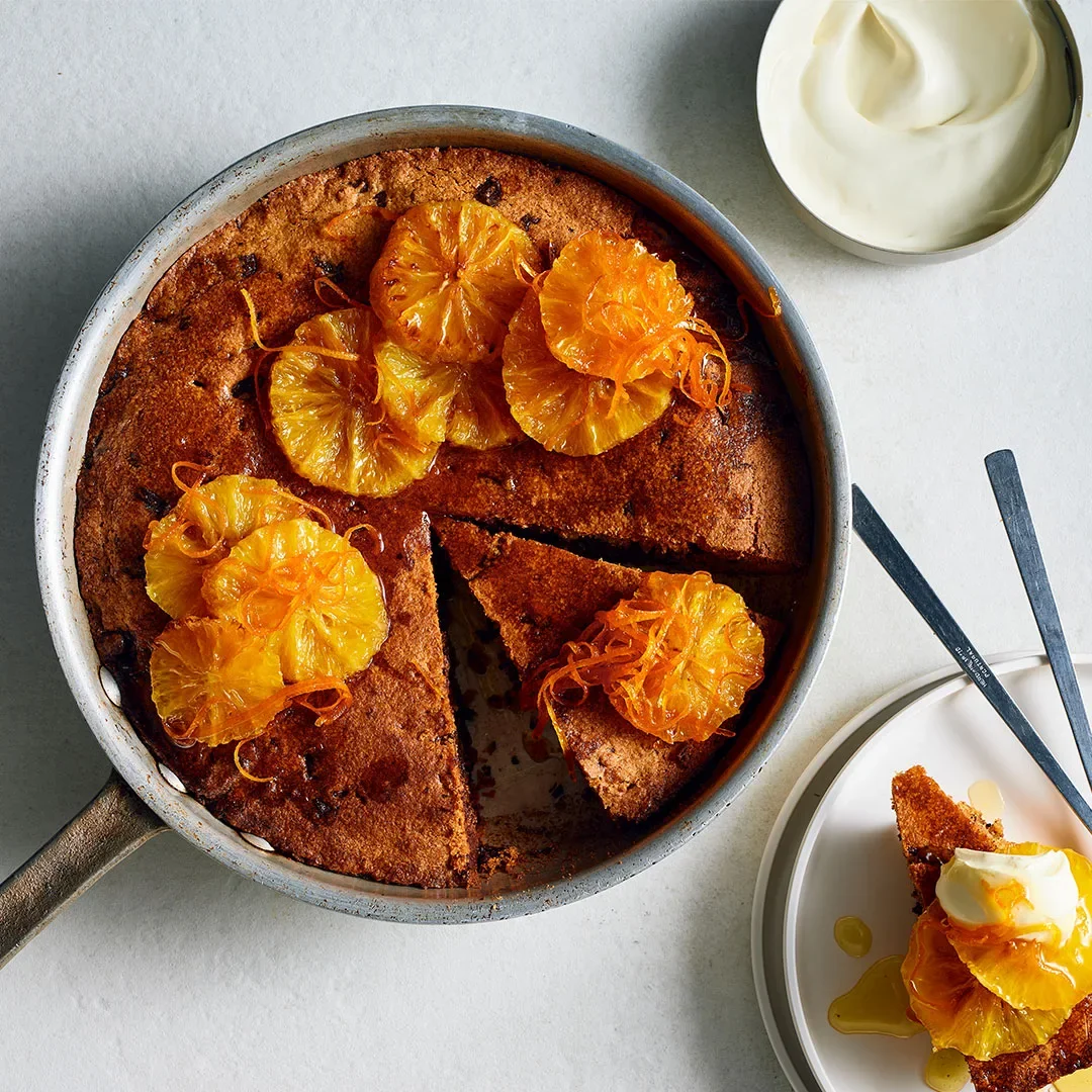 Almond and chocolate skillet cake with roast oranges