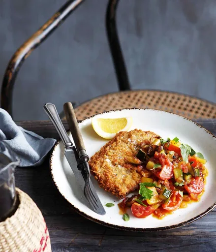 Escalopes de ternera empanados con caponata
