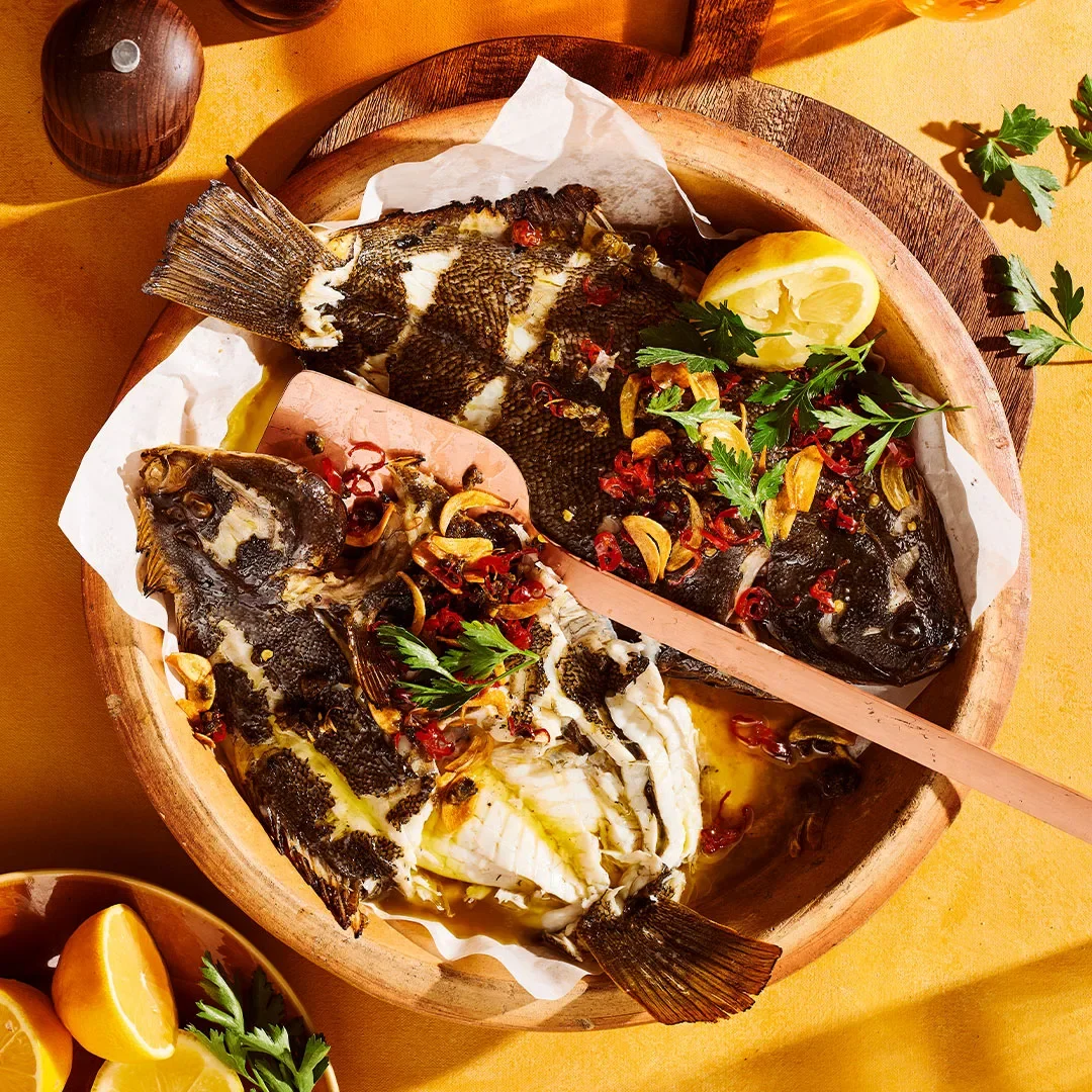 Lennox Hastie’s grilled whole flounder with pil-pil and capers