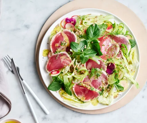 Seared tuna with baby spring greens