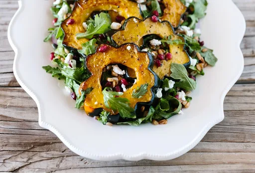 Roasted Acorn Squash Salad with Spicy Pepitas and Cranberries