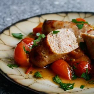 Roasted Sausages With Tomatoes, Peppers And Onions