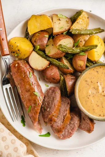 Salchicha italiana y patatas al horno