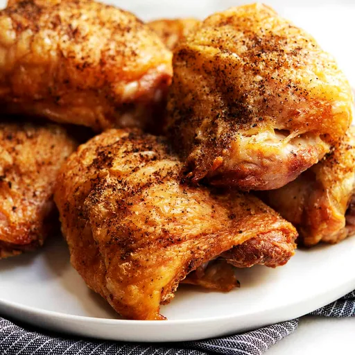 Muslos de pollo con hueso a la parrilla