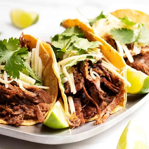 Tacos de carnitas de cerdo