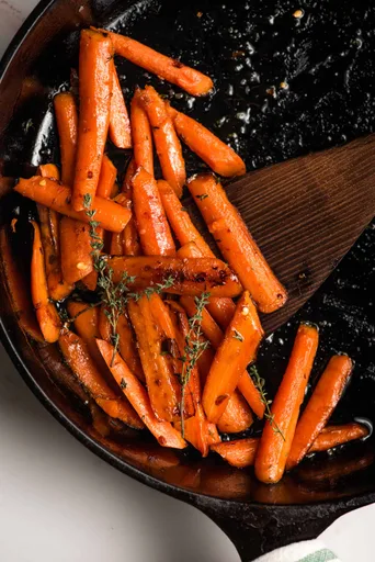 Zanahorias salteadas con miel y tomillo