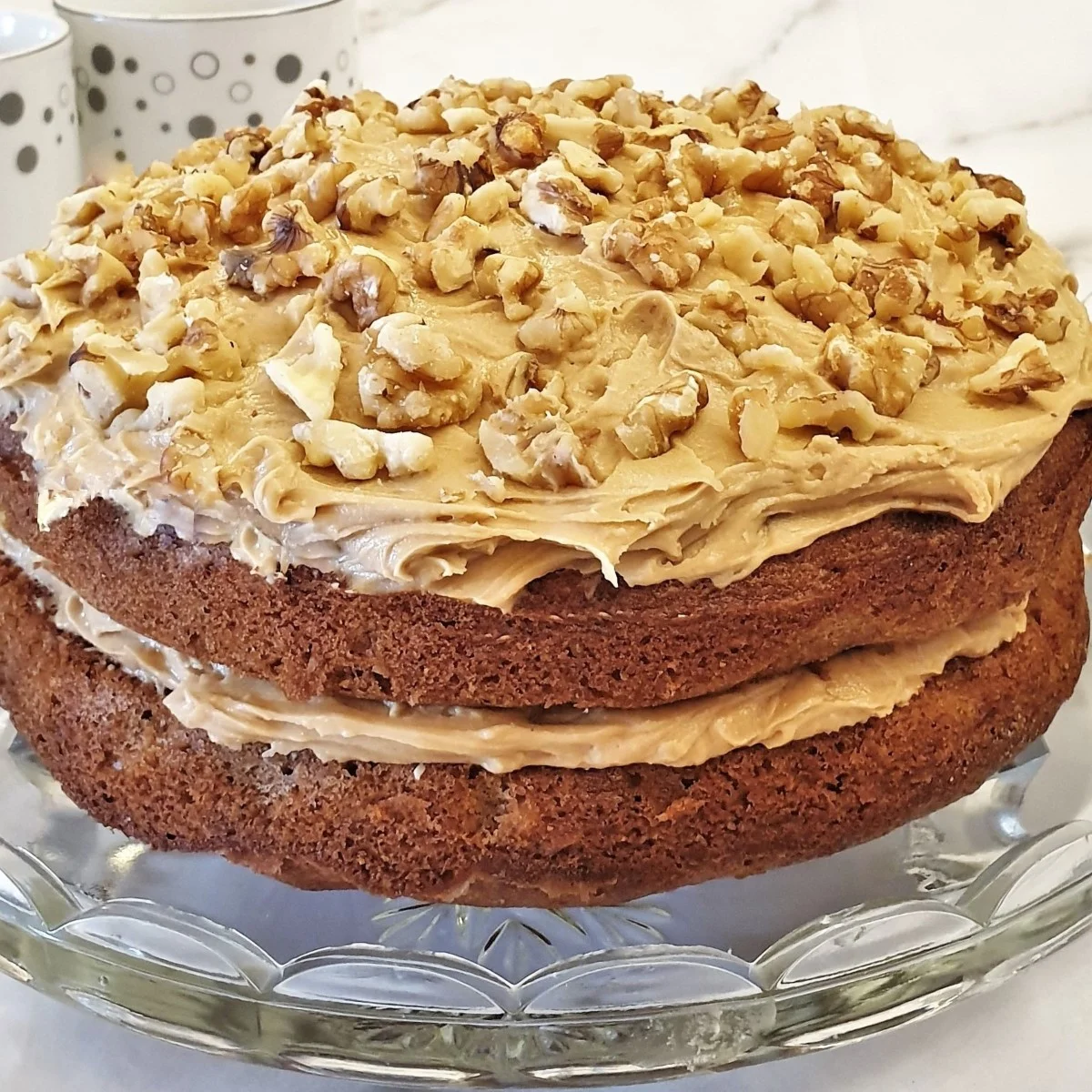 Coffee and walnut layer cake with coffee buttercream frosting