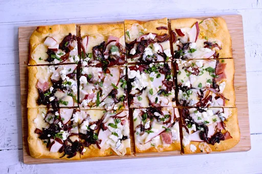 Pear and goat cheese pizza with caramelized onions (Sip Bite Go)