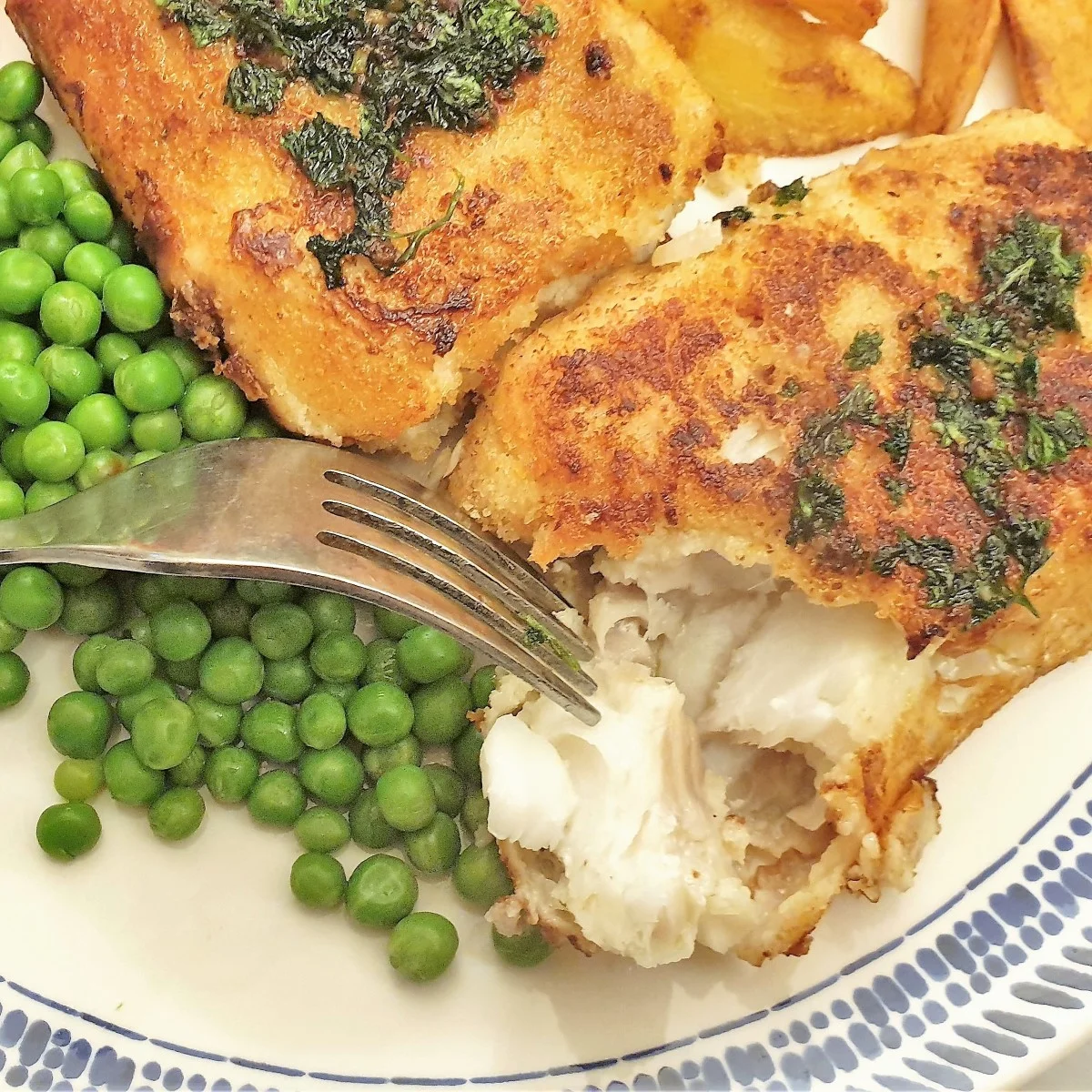 Fish Milanese with a garlic and parsley sauce