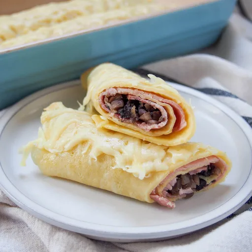 Ficelle picarde - crepes gratinados de champiñones y jamón