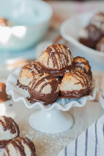 Chocolate-dipped coconut macaroons
