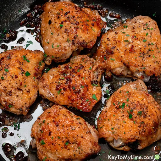 Receta de Muslos de Pollo al Horno con Mantequilla de Ajo y Piel Crujiente