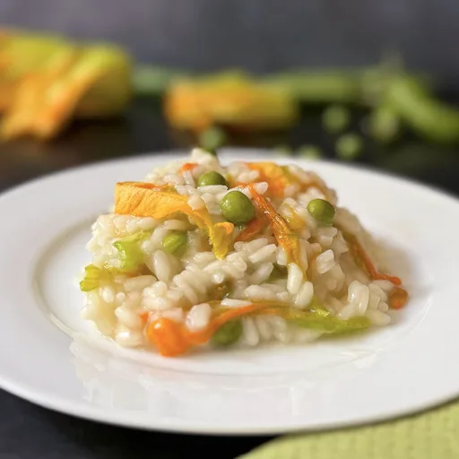 Receta de risotto con guisantes y flores de calabacín