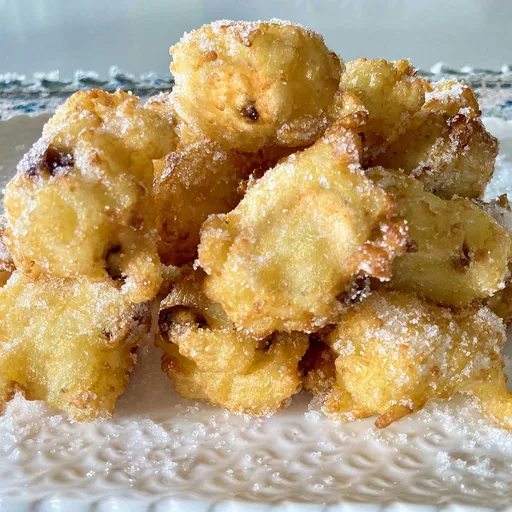 Frittelle di Riso (Buñuelos de arroz dulces tradicionales italianos)