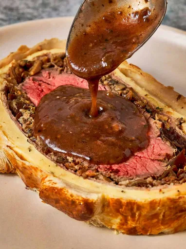 Beef Wellington with Truffle Red Wine Sauce