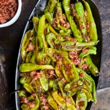 Sticky Honey Garlic Blistered Shishito Peppers with Bacon